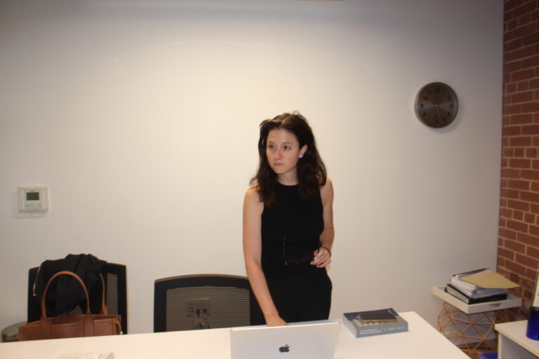 Turkish and French speaking Yeliz Beygo, a litigation and dispute resolution lawyer, stands in her Toronto office